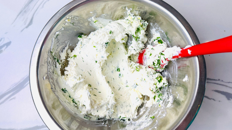 Herby cream cheese mixture in bowl