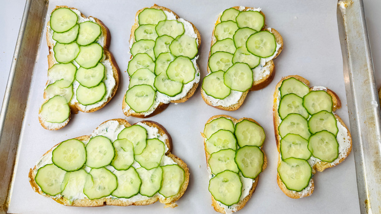 Slices of bread topped with cucumber slices