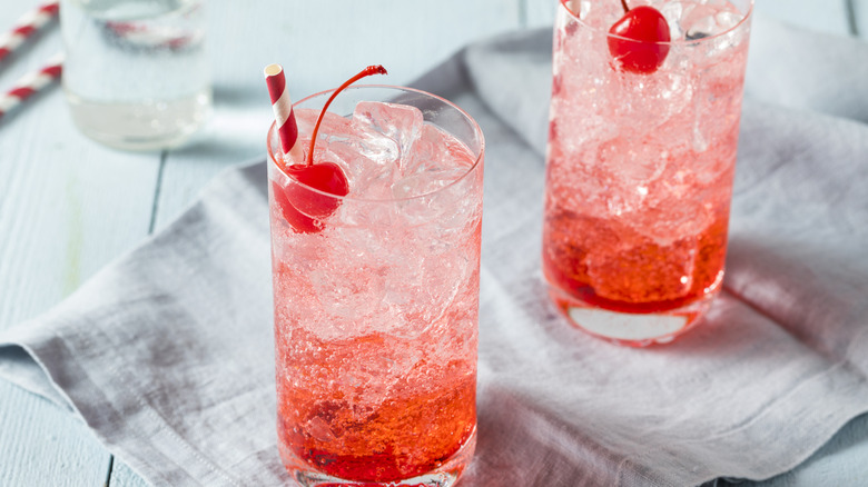 Shirley Temples in glasses with cherry garnish