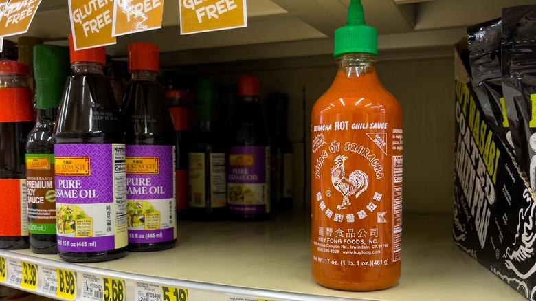 Sriracha on bare shelf