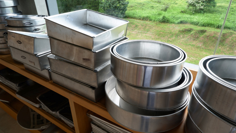 Nests of cake pans stacked inside of each other