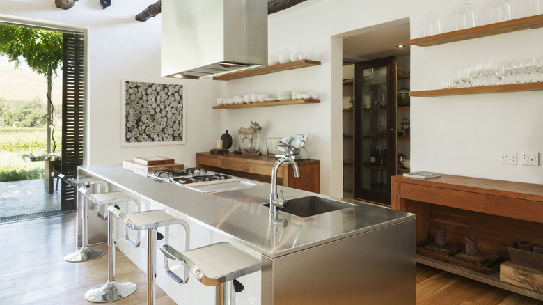 View of open-concept kitchen with stainless steel counters