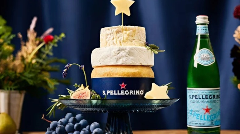 Tucci cheese wheel cake Sanpelligrino