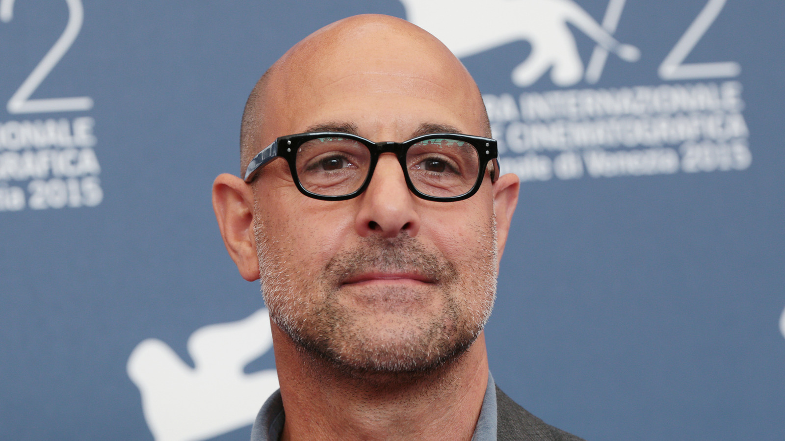 Stanley Tucci's Corn-Buttering Trick Delivers A Built-In Edible Bonus - Tasting Table