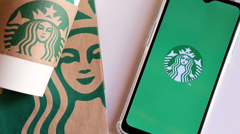 Starbucks cup, bag, and app