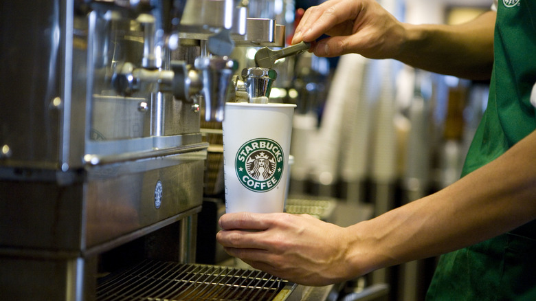 Starbucks barista making coffee