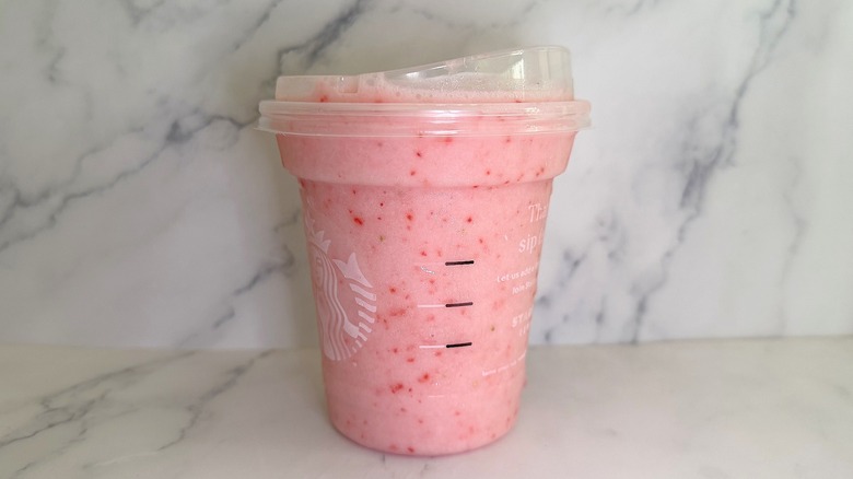 Starbucks Blended Pink Energy Drink on marble surface