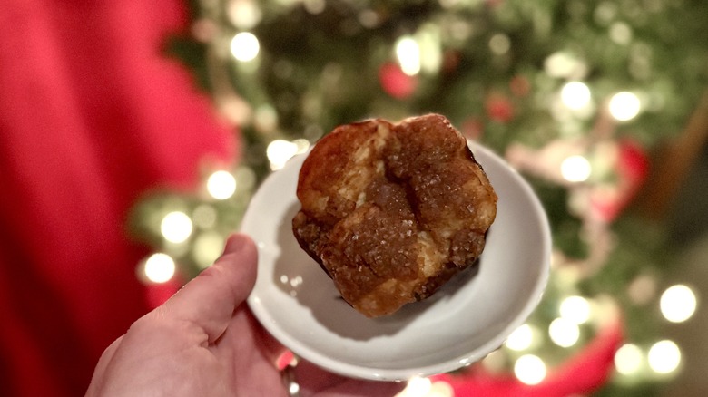 Cinnamon Pull-Apart Bread hovers above a Christmas tree