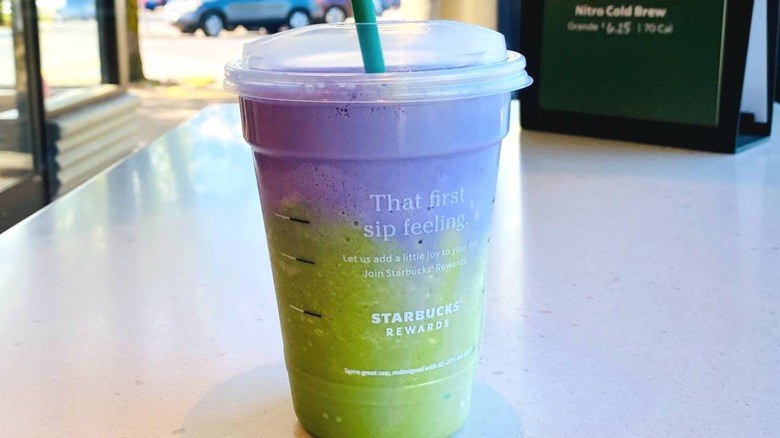 A Frosty Ube Matcha Frappuccino on Starbucks table