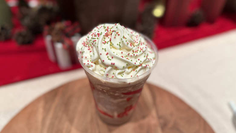 Frozen Peppermint Hot Chocolate on a wooden plate