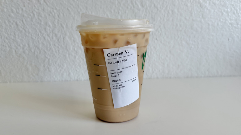 Iced caffè latte in a plastic cup