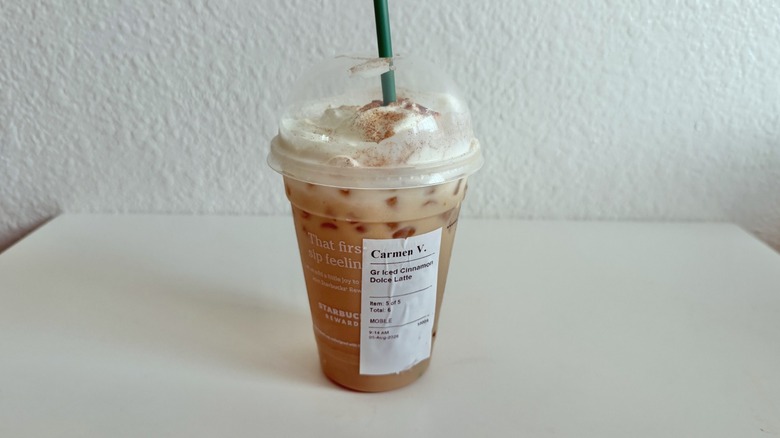 Cinnamon dolce iced latte with whipped cream