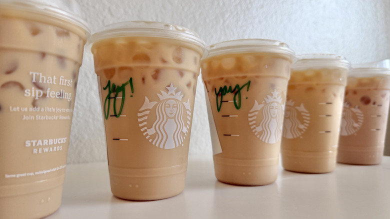 Close-up of several Starbucks iced lattes