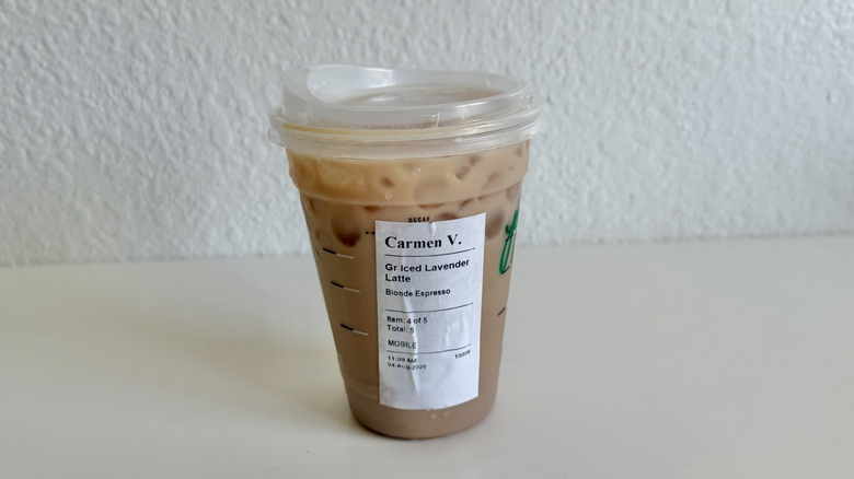 Lavender iced latte with a sticker