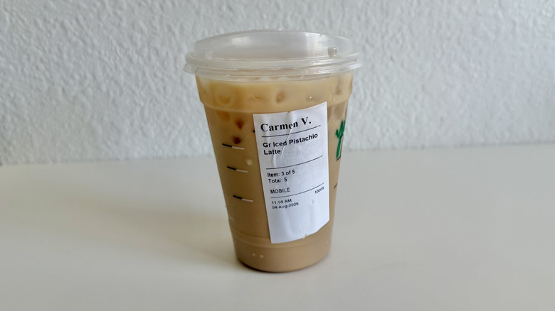 Pistachio iced latte on a table