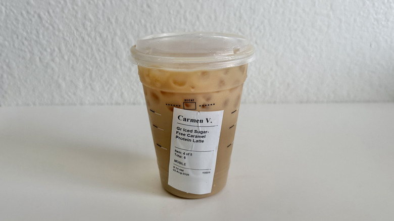 Sugar-free caramel protein iced latte on a table