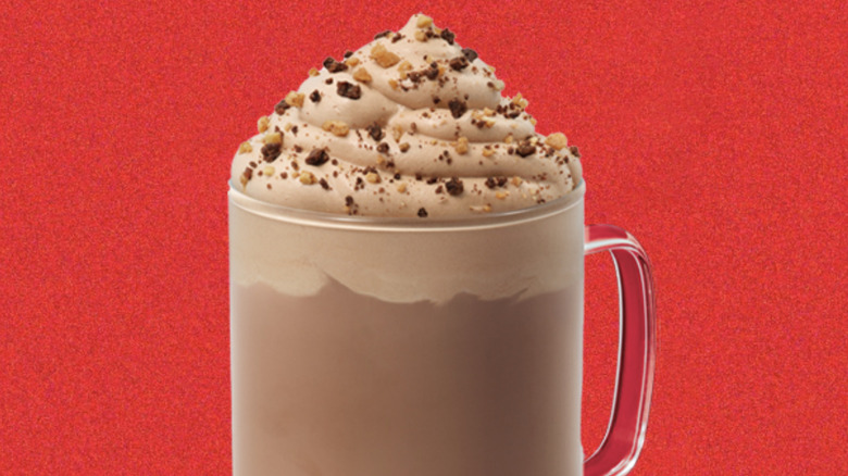 Starbucks hot drink with whipped cream and toppings
