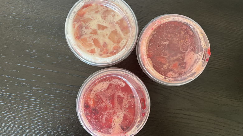 Three Starbucks Mango Strawberry Refreshers from top.