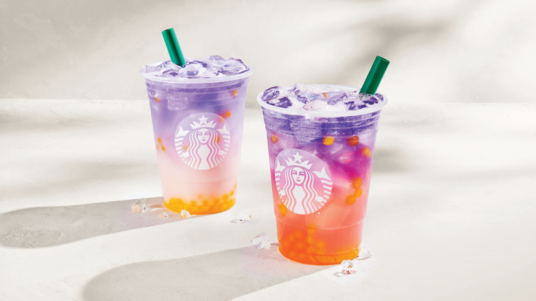 Starbucks Tropical Butterfly Refresher drinks on white background