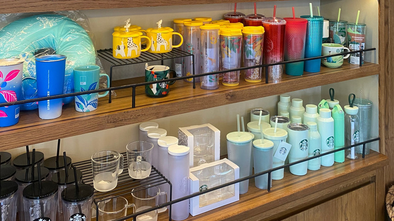Shelves lined with Starbucks branded bottles in various styles