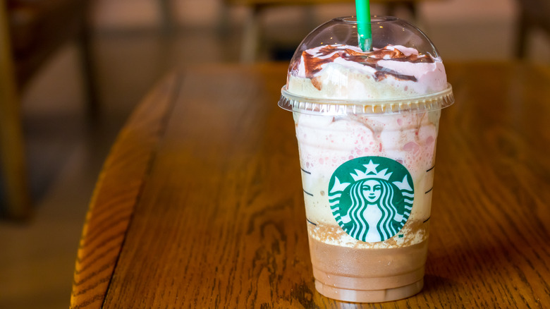 A Starbucks frappucchino with red sauce