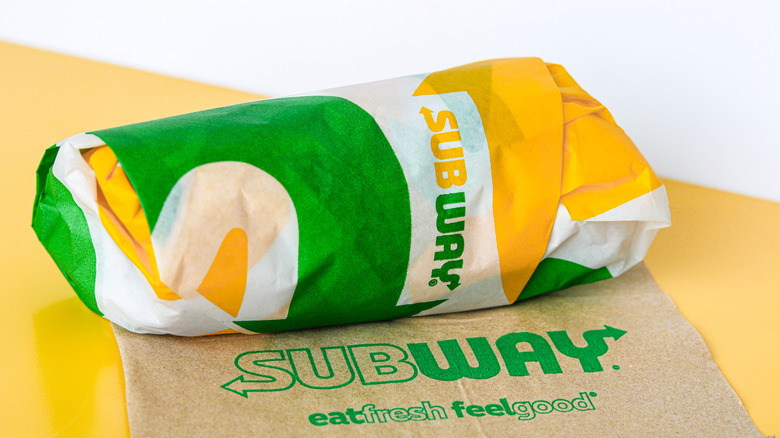 Subway sandwich in wrapper with napkin