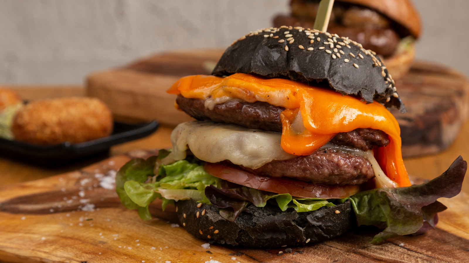 Start Topping Burgers With This Grassy Cheese And It'll Be Your New Favorite - Tasting Table