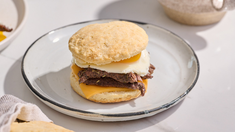 steak and egg sandwich on a plate