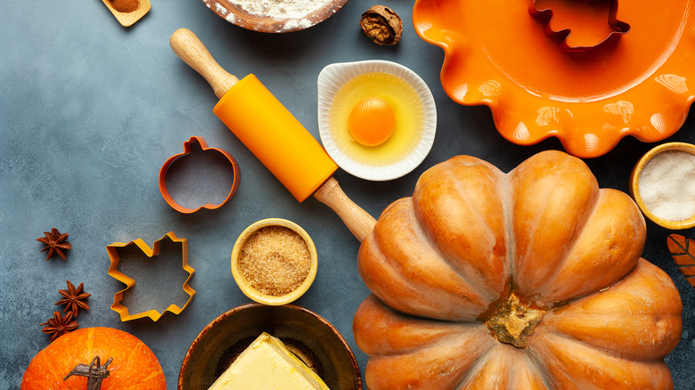 Pie pumpkin surrounded with tools