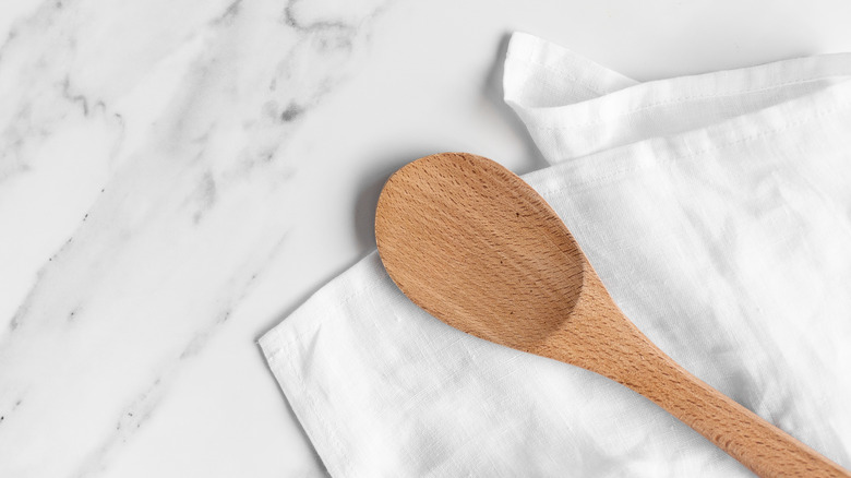 wooden spoons on marble
