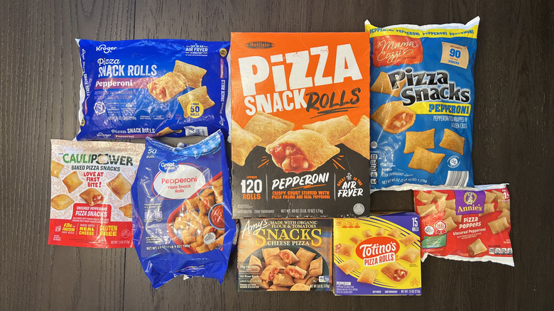 8 different bags and boxes of pizza rolls.
