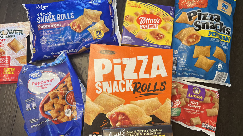 8 different bags and boxes of pizza rolls.