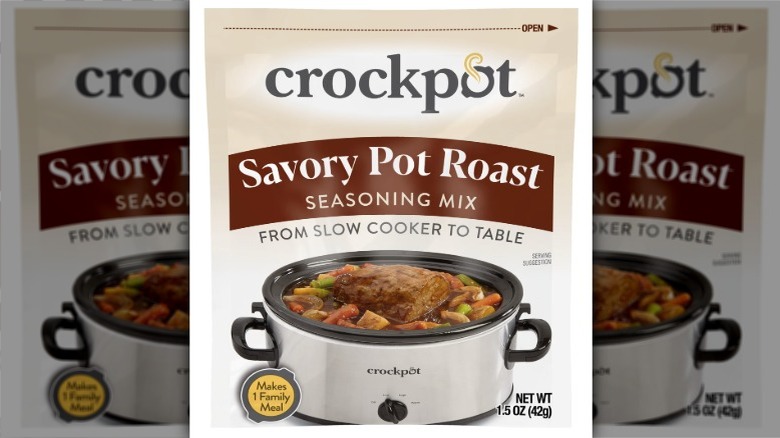 A packet of Crockpot Savory Pot Roast mix is shown on a white background.