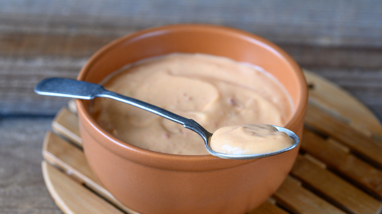 Dish of yum yum sauce with a teaspoon