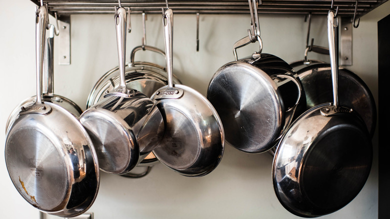 Hanging pots and pans in the kitchen