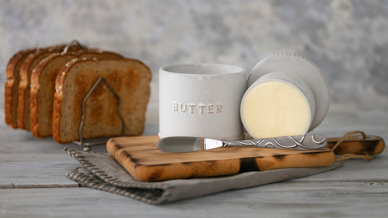 Butter bell on wood cutting board