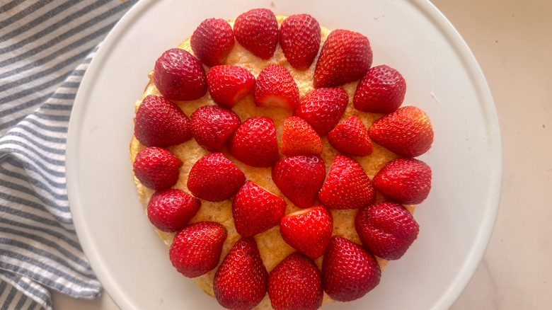 strawberries on cake layer