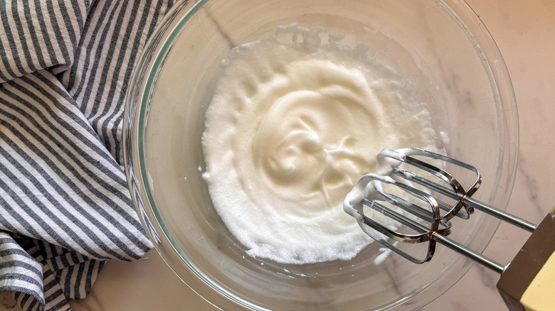 hand beating meringue