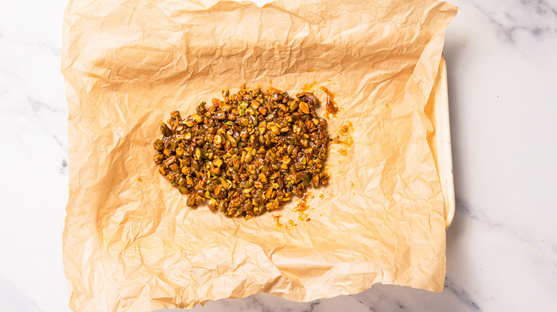 Pistachio brittle on baking sheet