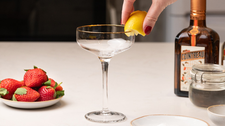 rubbing lemon juice on glass
