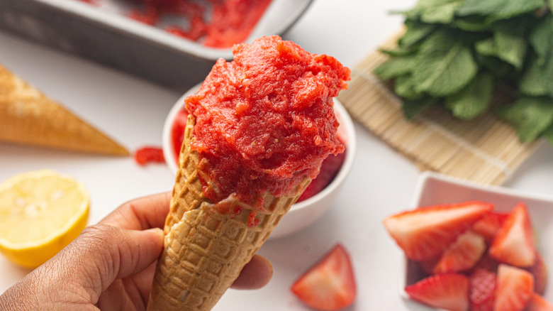strawberry sorbet in waffle cone
