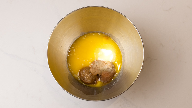 butter and sugars in bowl