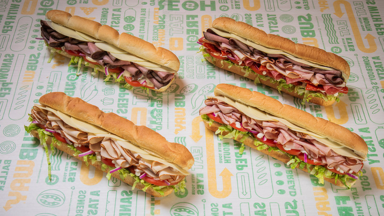 Four Subway sandwiches