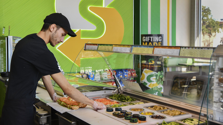 Subway worker making sandwich