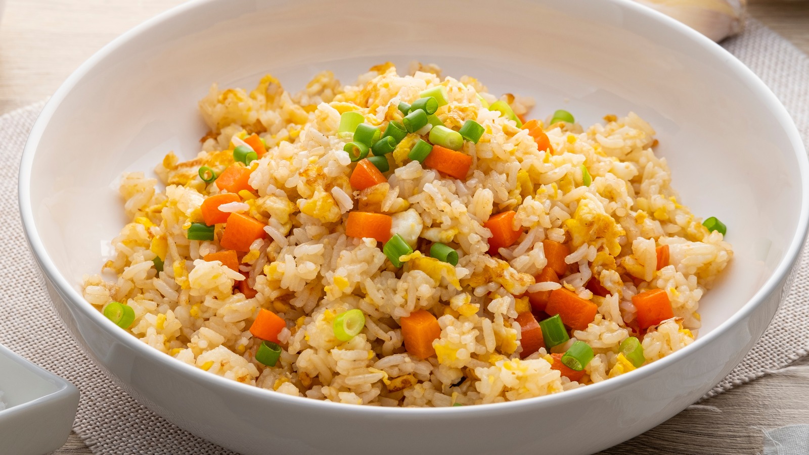 https://www.tastingtable.com/img/gallery/sugar-is-the-secret-ingredient-for-fried-rice-that-rivals-takeout/l-intro-1694043415.jpg