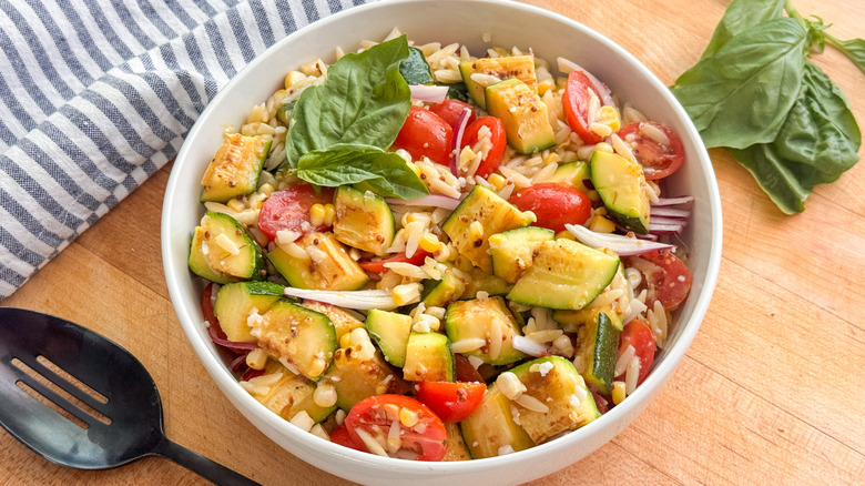 white bowl with orzo pasta salad