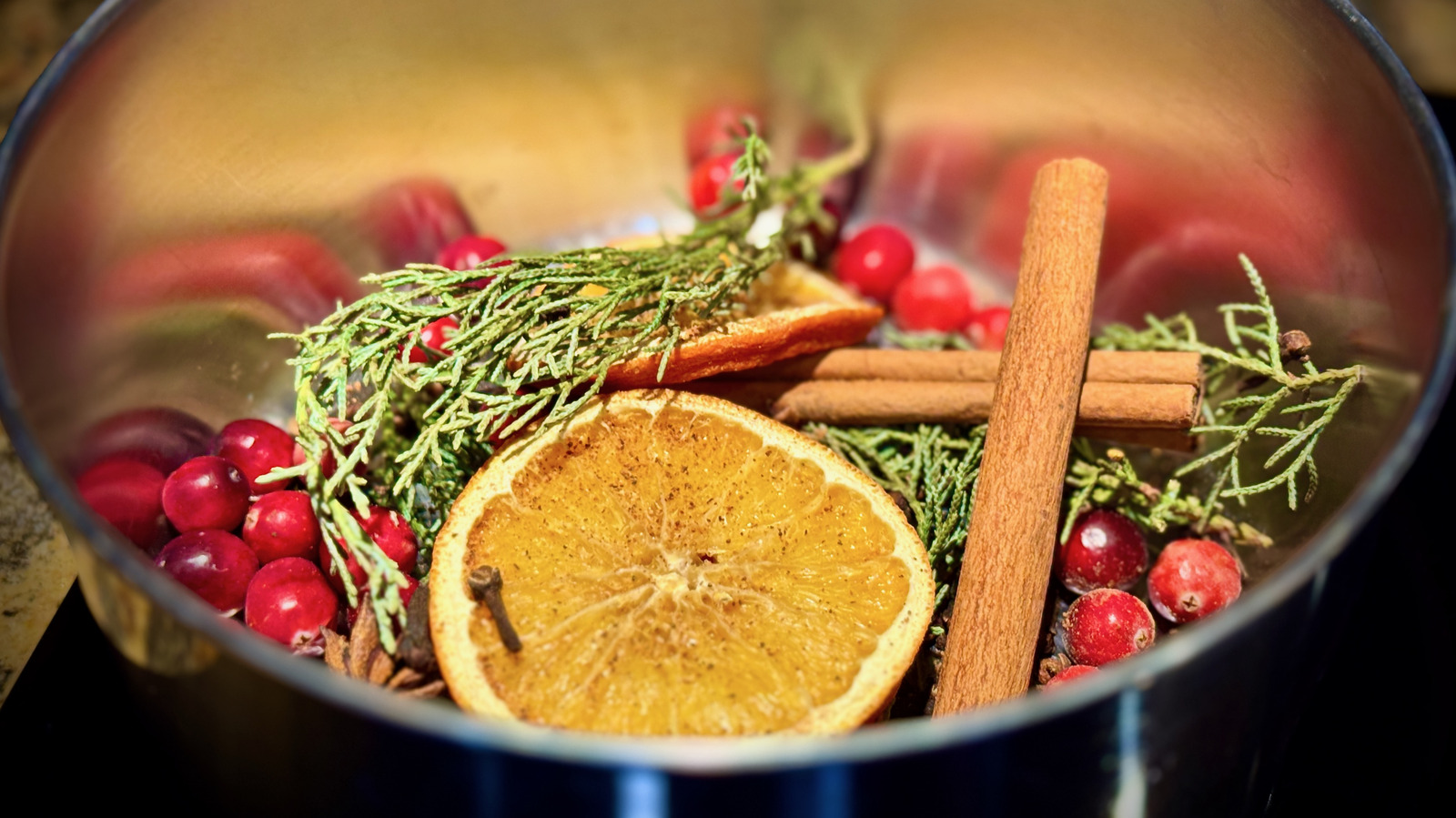 Citrus, Herbs, And Spices: Why You Should Leave These Boiling In Your Kitchen This Summer