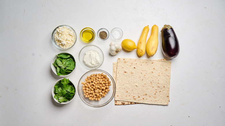 Vegetable pinwheel sandwich ingredients on a table