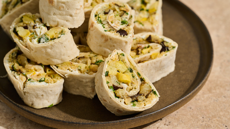 vegetable pinwheels piled on a plate