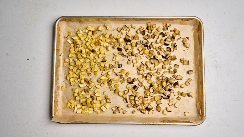 roasted vegetables on a sheet tray